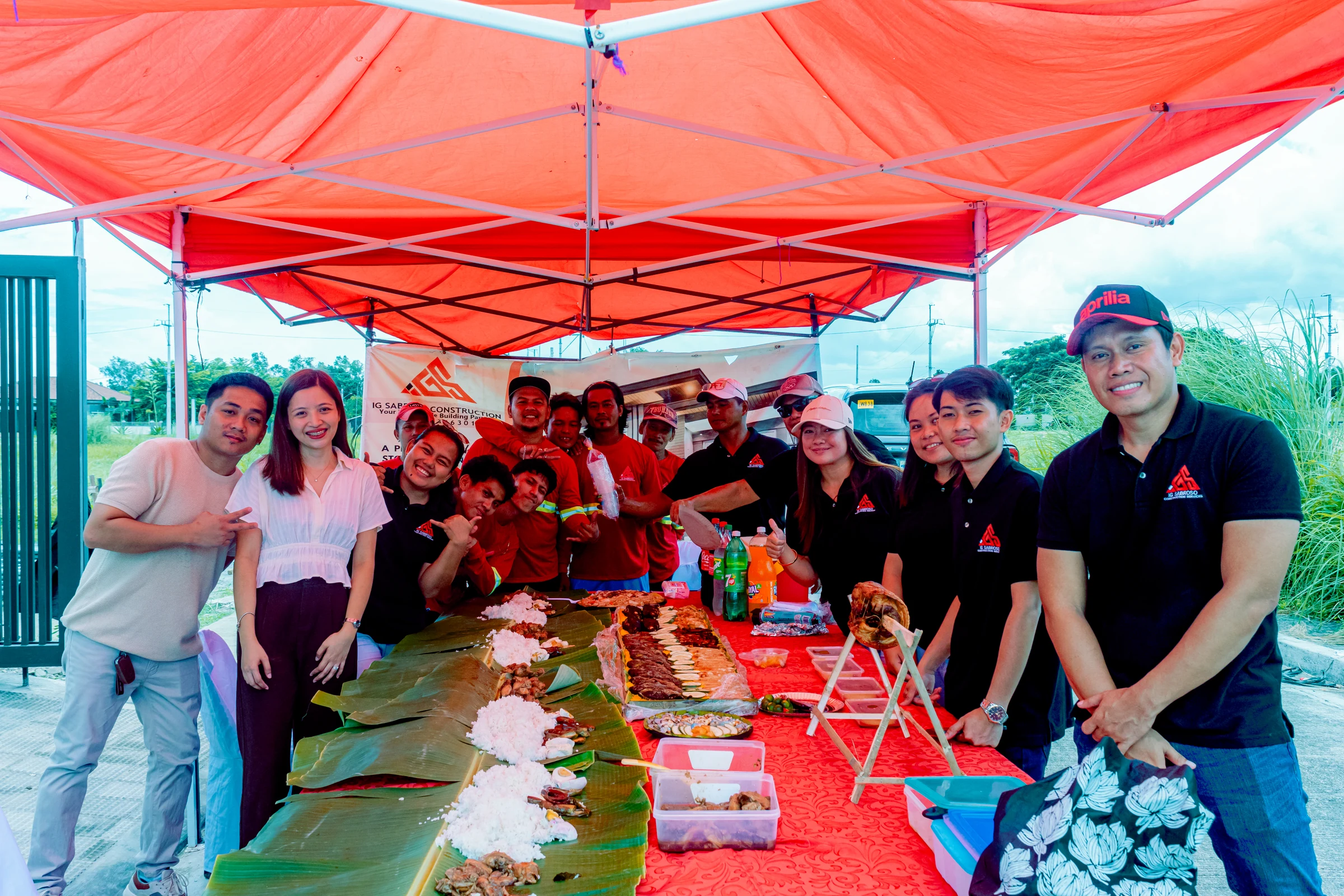 IG Sabroso team gathered with clients at a project event